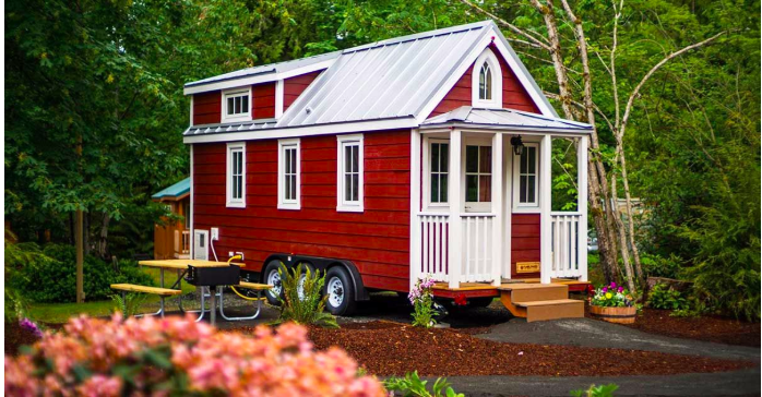 Wax nostalgic in this tradition-filled 2-bedroom tiny red house