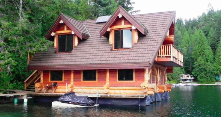 Who Wants To Hang A Fishing Line Over The Balcony Of This Log Cabin On The Lake?